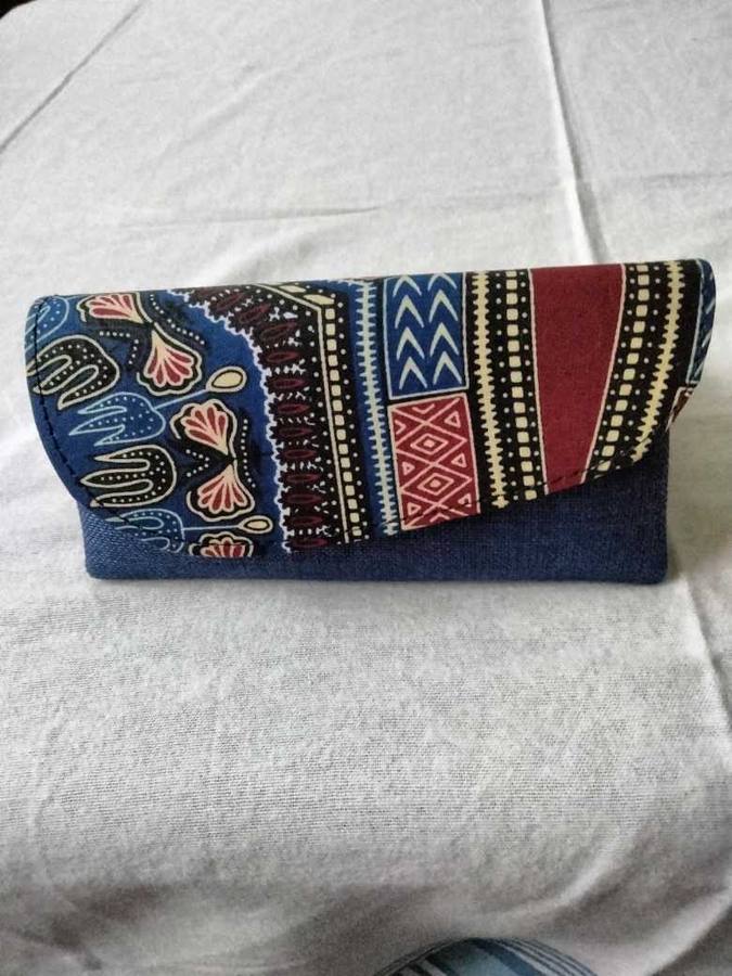 Indigo denim clutch wallet with a patterned flap