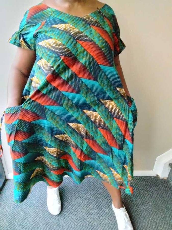 Teal and rust Ankara handkerchief-hem dress