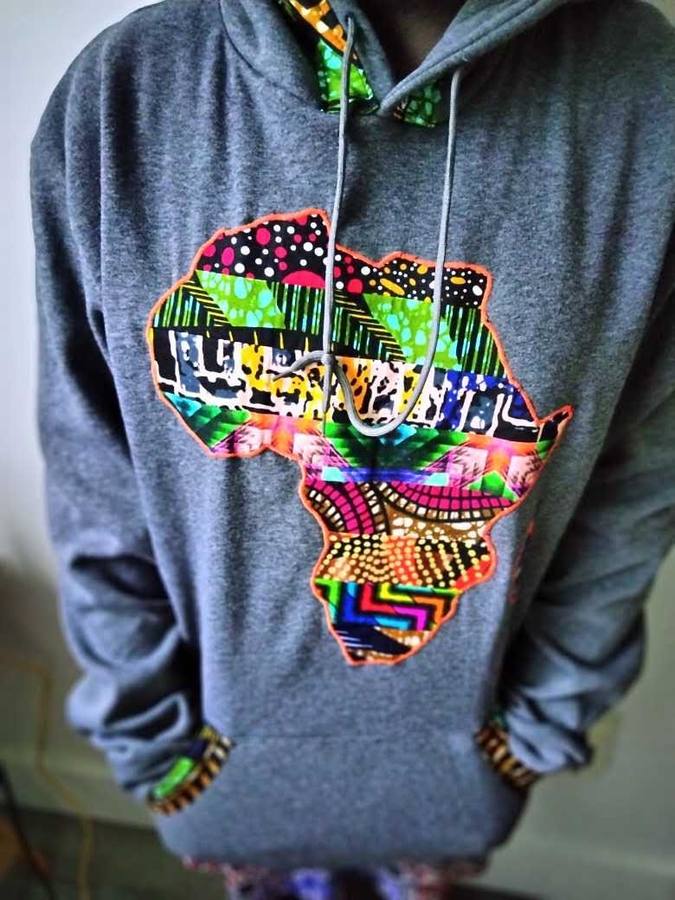 Grey hoodie with a hand-appliquéd map of Africa in mixed wax prints
