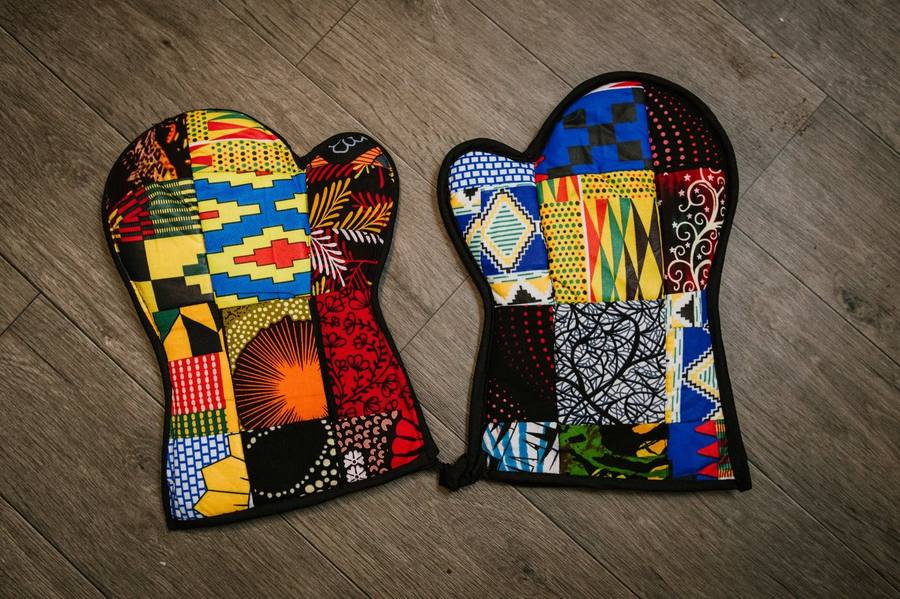 A pair of patchwork Ankara oven mitts in mixed prints