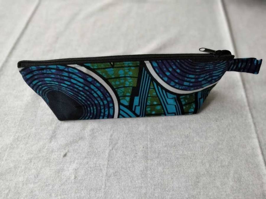 Indigo and teal swirling pattern zippered pouch