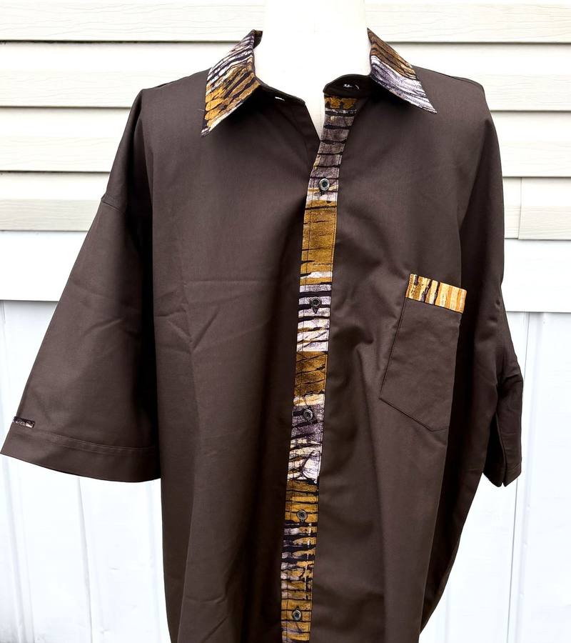 Espresso brown men's shirt with a gold and cream patterned collar, placket, and pocket trim