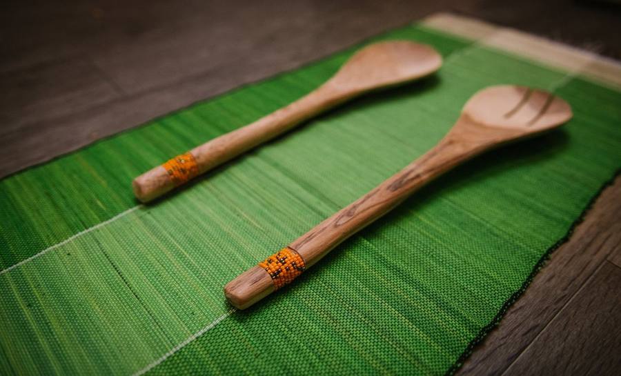 Hand-carved wooden salad servers with beaded handles